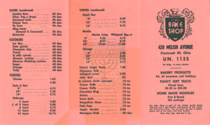 A pink menu from the bake shop listing items for sale alongside prices.